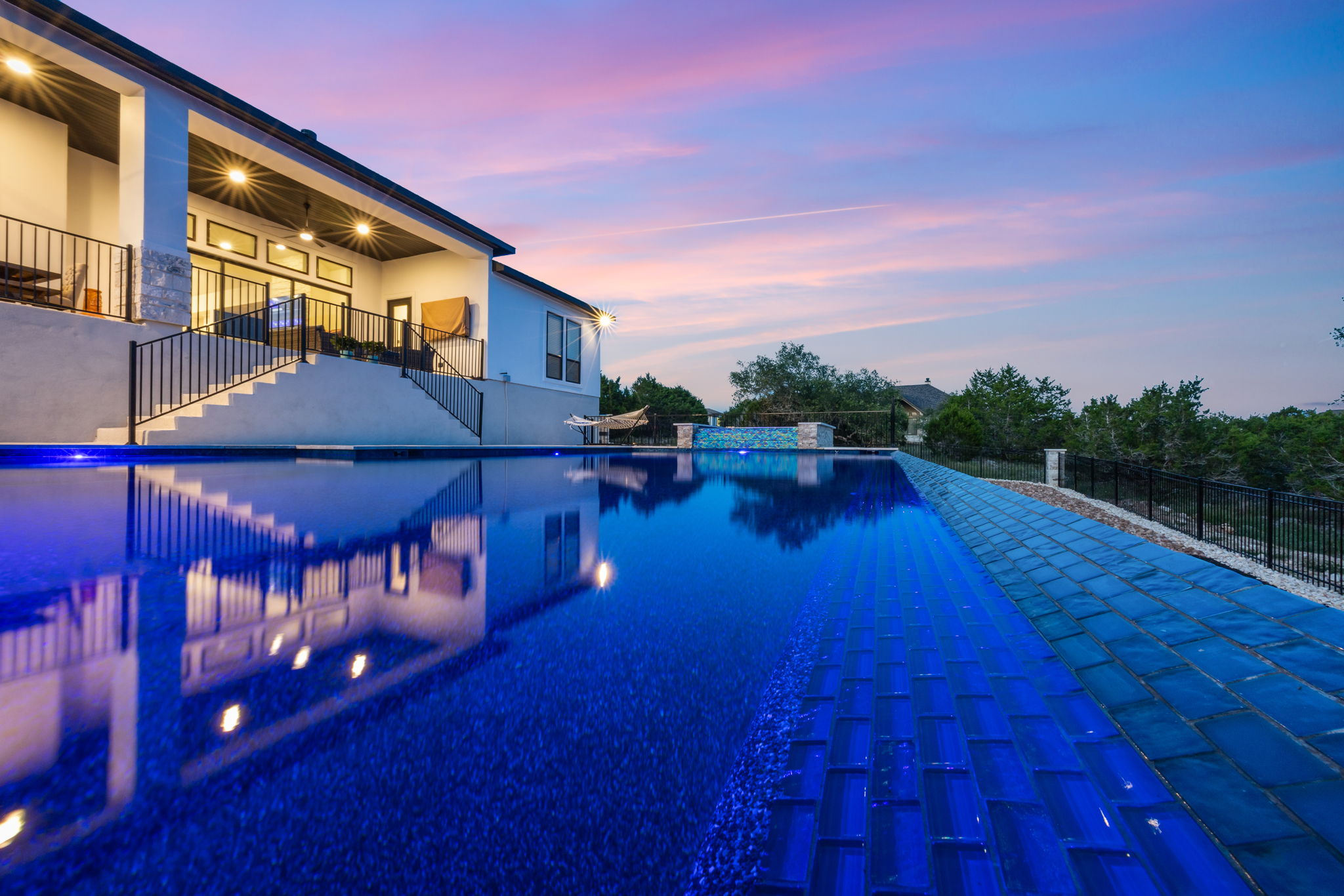 Pool with pergola and outdoor living space